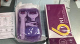 6-in-1 purple derma roller system with multiple roller heads and packaging box on a table
