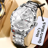 Silver watch with a white face on a beige surface, featuring a 'Men's Quartz Watch' tag.
