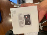 Hand holding boxed ANC/ENC wireless earbuds with dual mic, noise reduction, and touch control