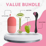 Value bundle with ice face roller in pink case, green jade roller, green Gua Sha tool, and black derma roller