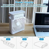 Portable air conditioner fan with LED night light and USB power, next to laptop on desk